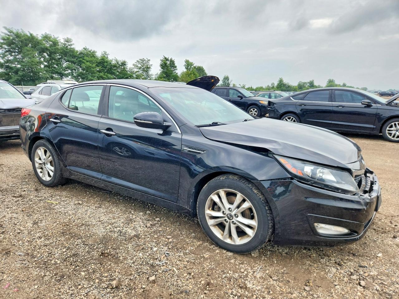 KNAGN4A72B5145000 · 2011 KIA OPTIMA · 4/12