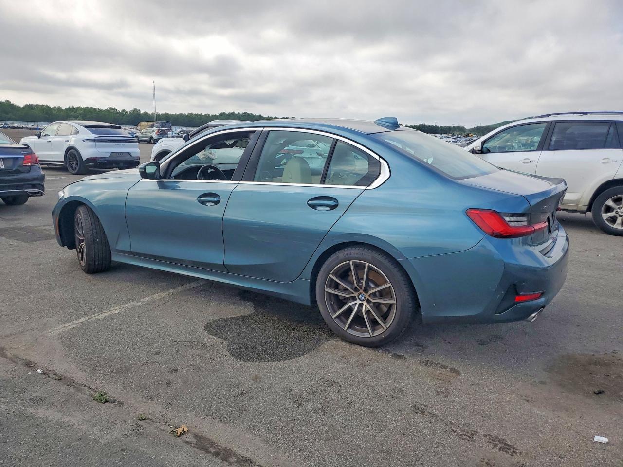 3MW5R7J05M8B96027 · 2021 BMW 330XI · 2/12