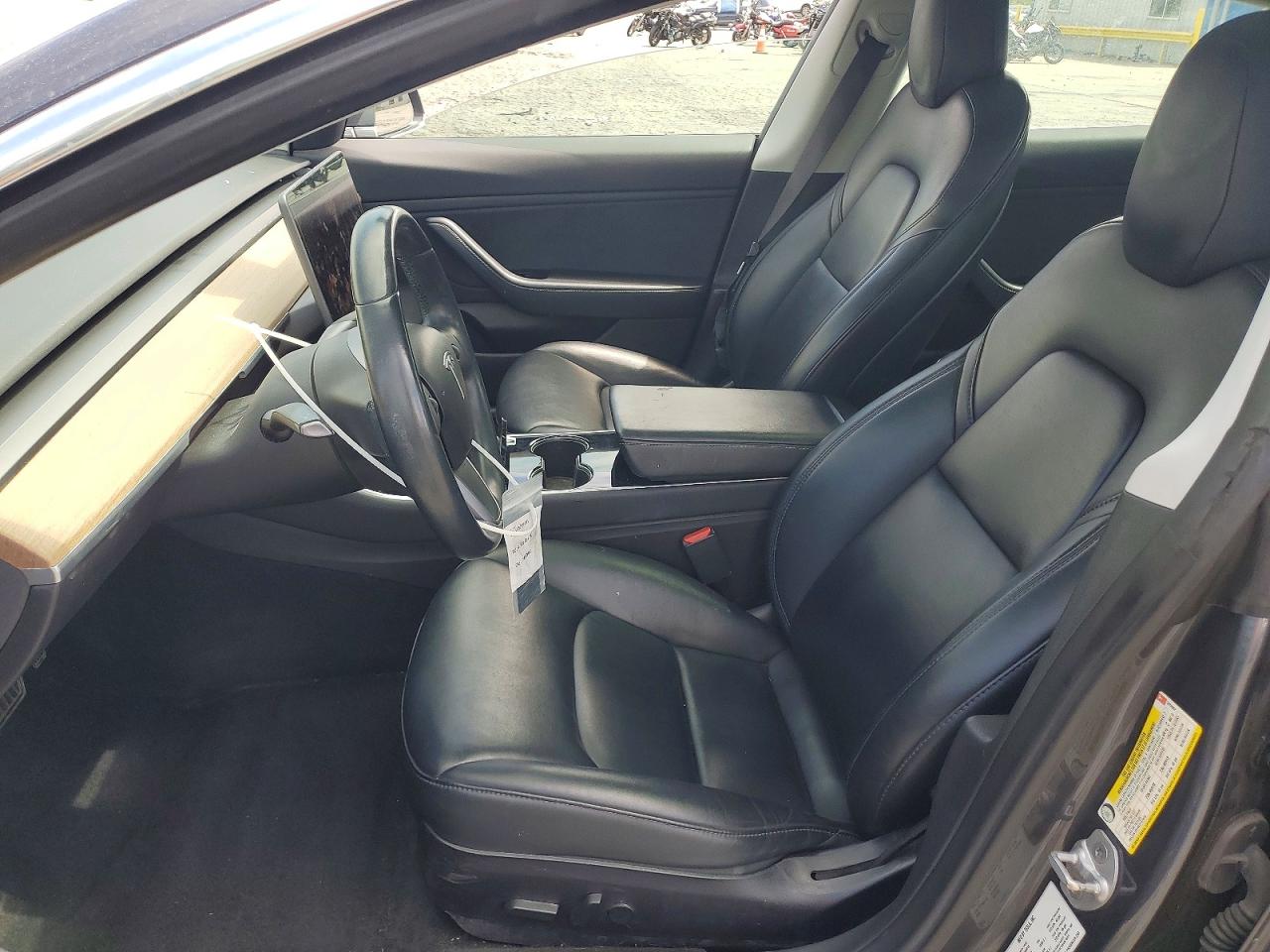 5YJ3E1EA0KF325502 · 2019 TESLA MODEL 3 · 7/12