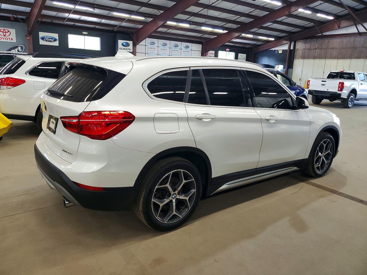 WBXHU7C37J5L09073 · 2018 BMW X1 · 3/13