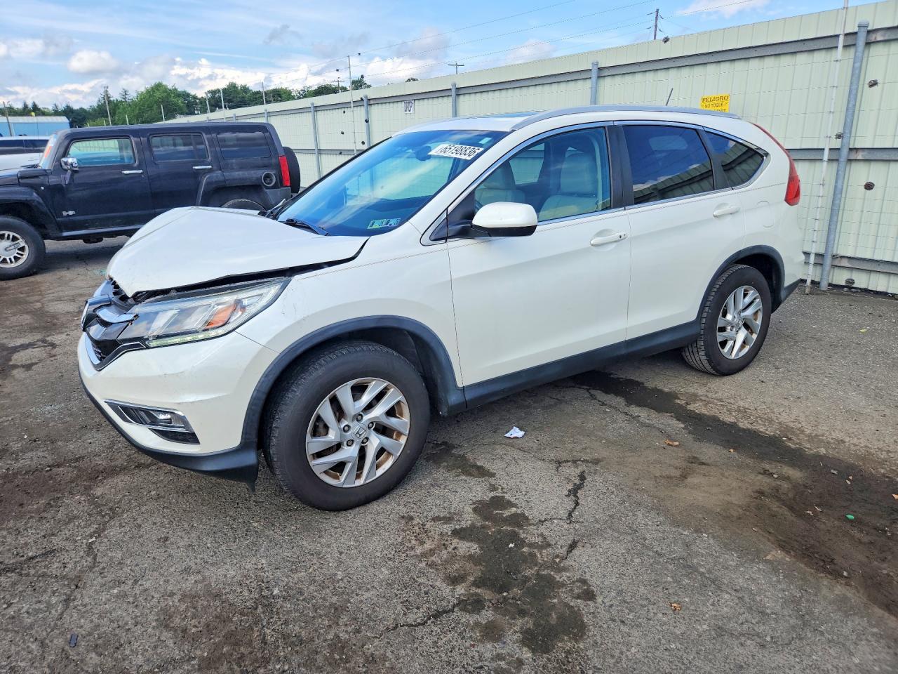 5J6RM4H77GL049381 · 2016 HONDA CR-V