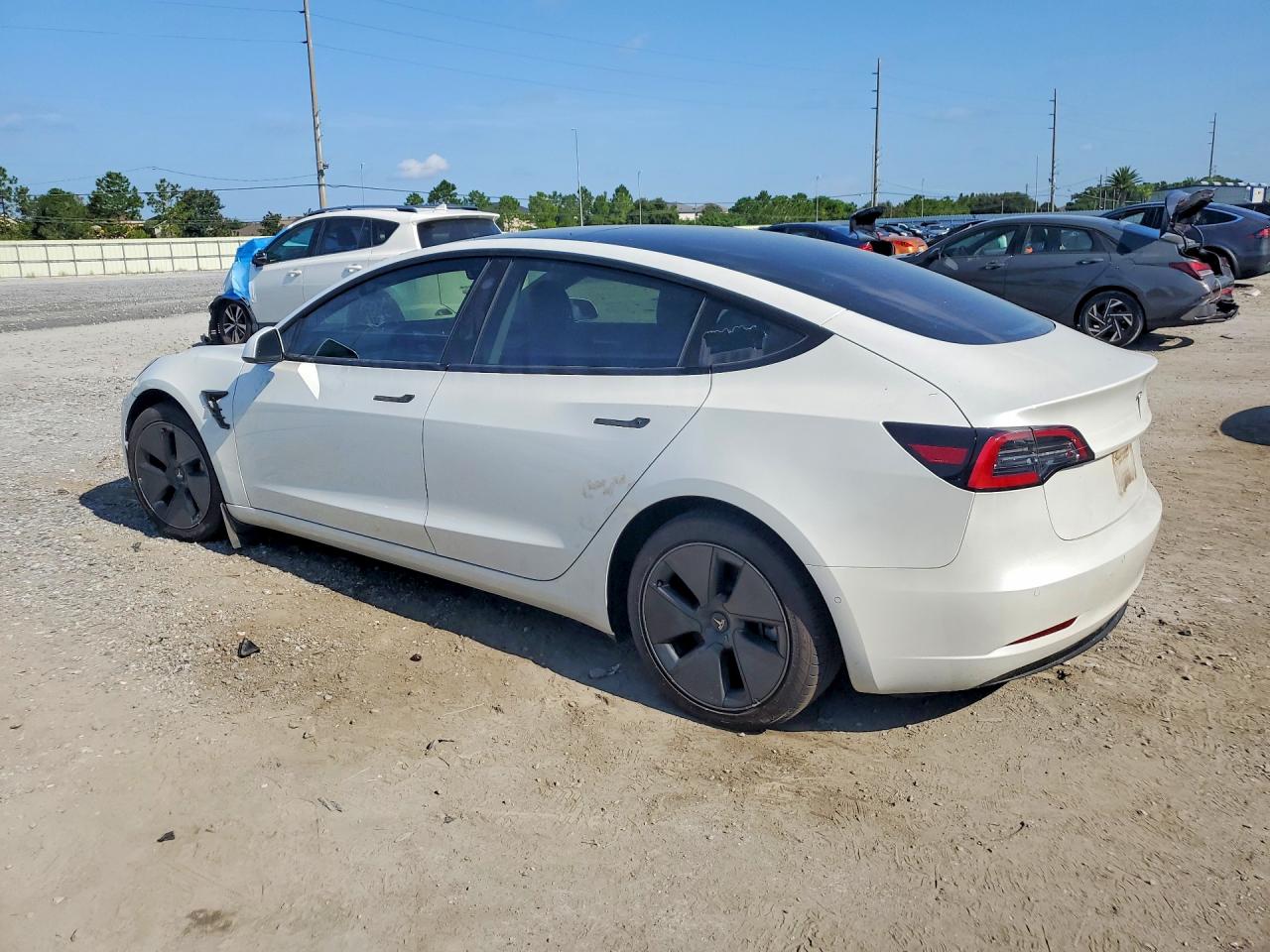 5YJ3E1EB6MF992702 · 2021 TESLA MODEL 3 · 2/12