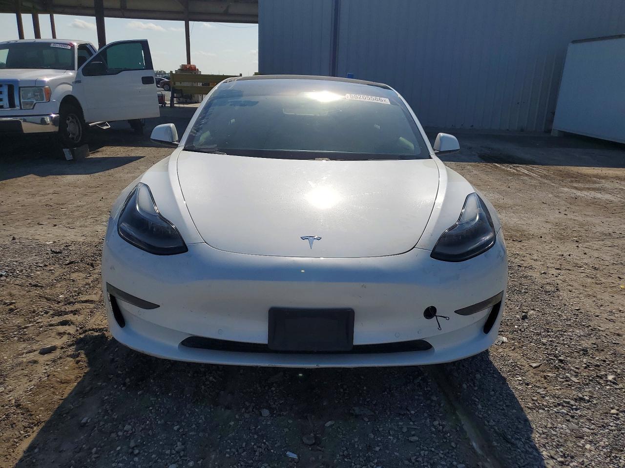 5YJ3E1EB6MF992702 · 2021 TESLA MODEL 3 · 5/12