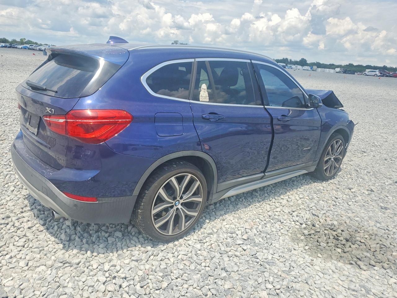 WBXHT3C37GP881818 · 2016 BMW X1 · 3/12