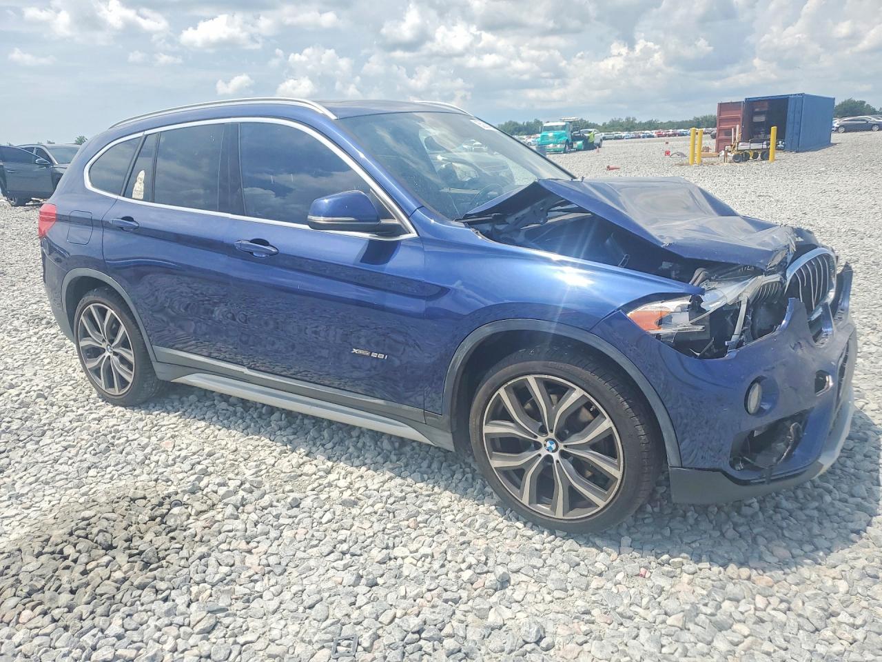 WBXHT3C37GP881818 · 2016 BMW X1 · 4/12