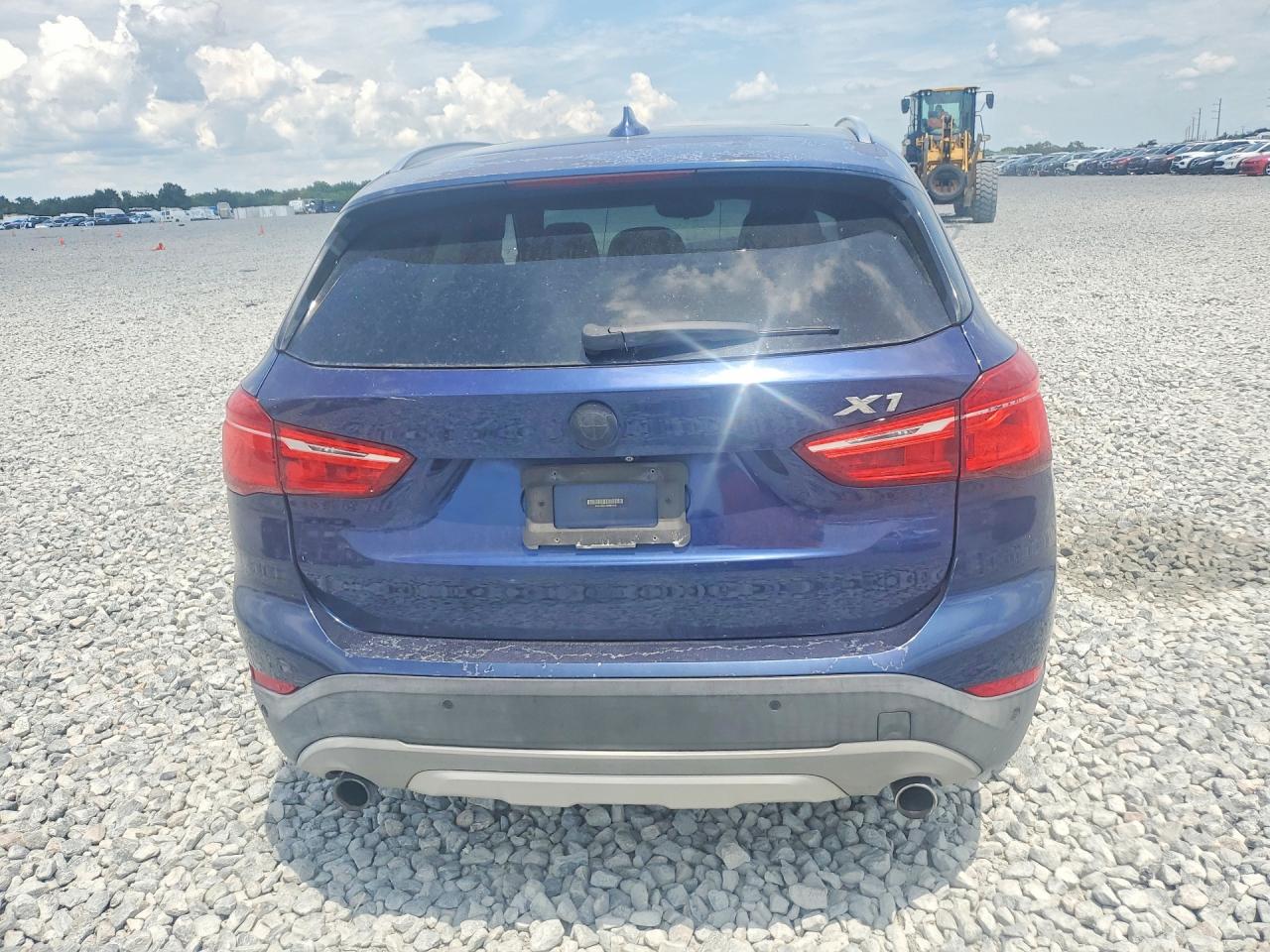 WBXHT3C37GP881818 · 2016 BMW X1 · 6/12
