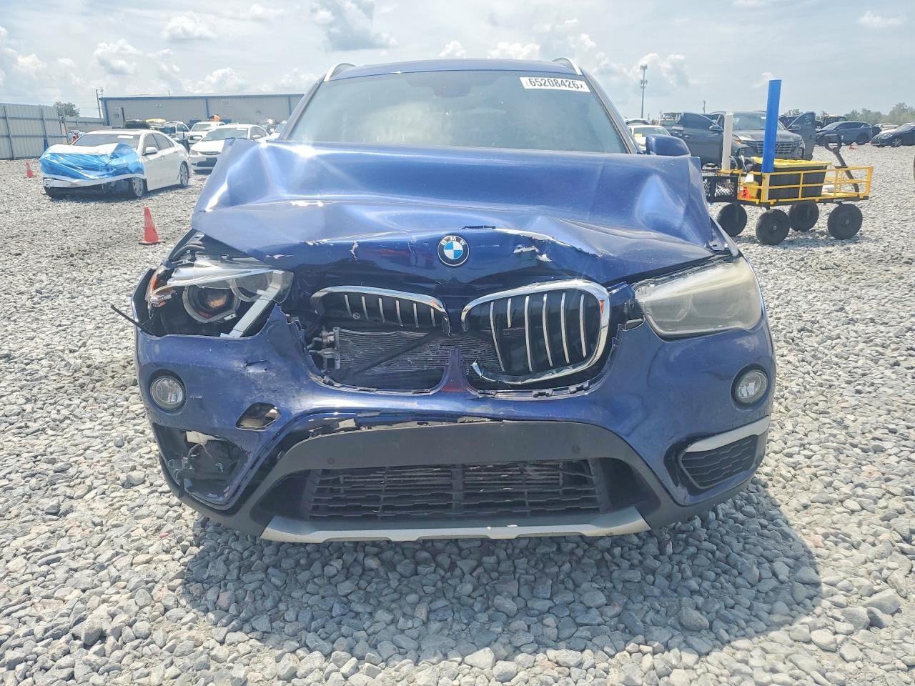 WBXHT3C37GP881818 · 2016 BMW X1 · 5/12