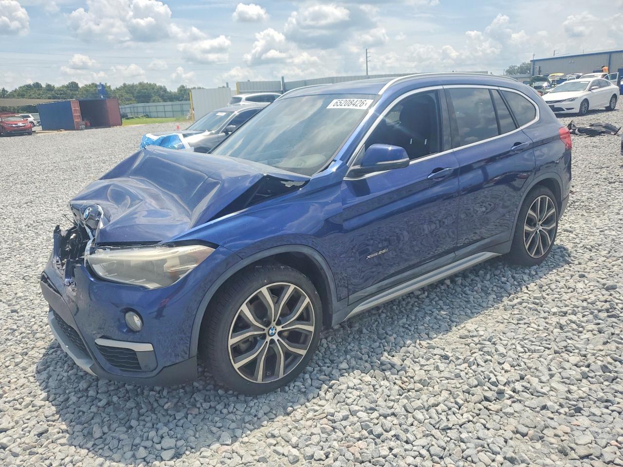 WBXHT3C37GP881818 · 2016 BMW X1