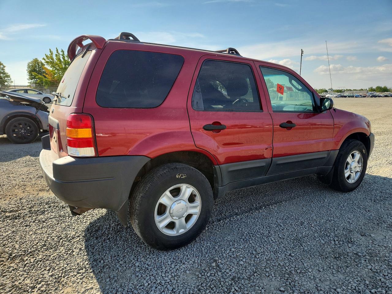 1FMCU93173KE00877 · 2003 FORD ESCAPE · 3/13