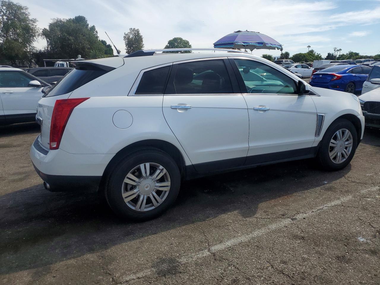 3GYFNBE31ES635653 · 2014 CADILLAC SRX · 3/13