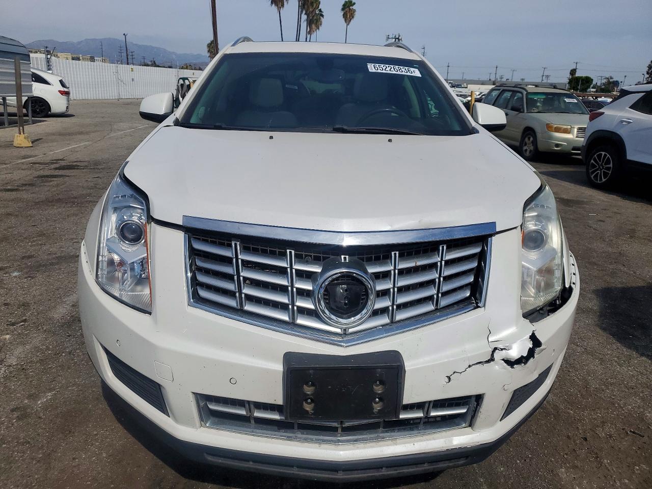 3GYFNBE31ES635653 · 2014 CADILLAC SRX · 5/13