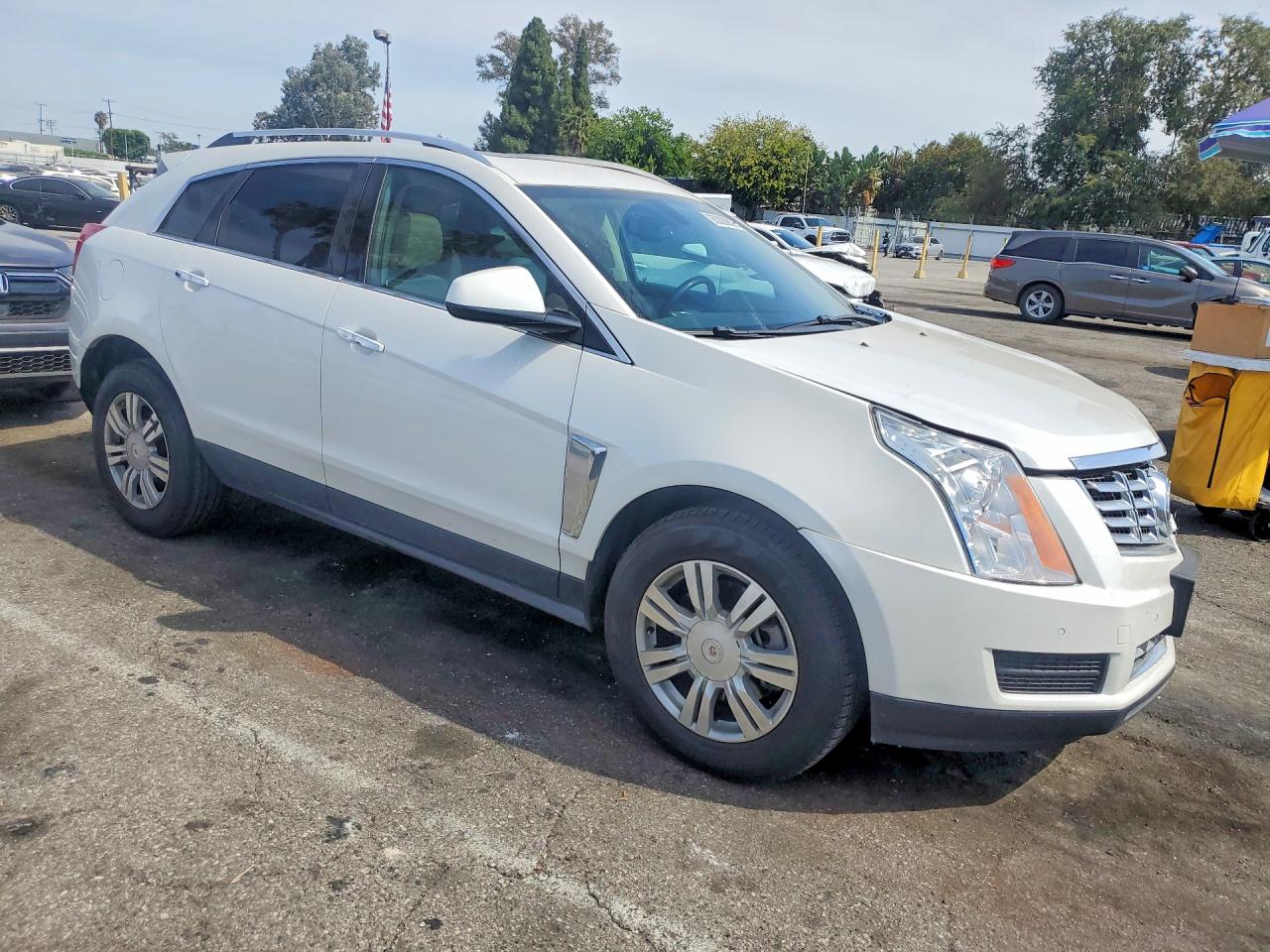 3GYFNBE31ES635653 · 2014 CADILLAC SRX · 4/13