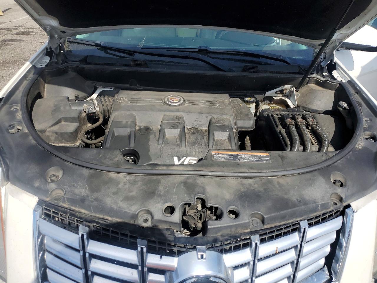 3GYFNBE31ES635653 · 2014 CADILLAC SRX · 12/13