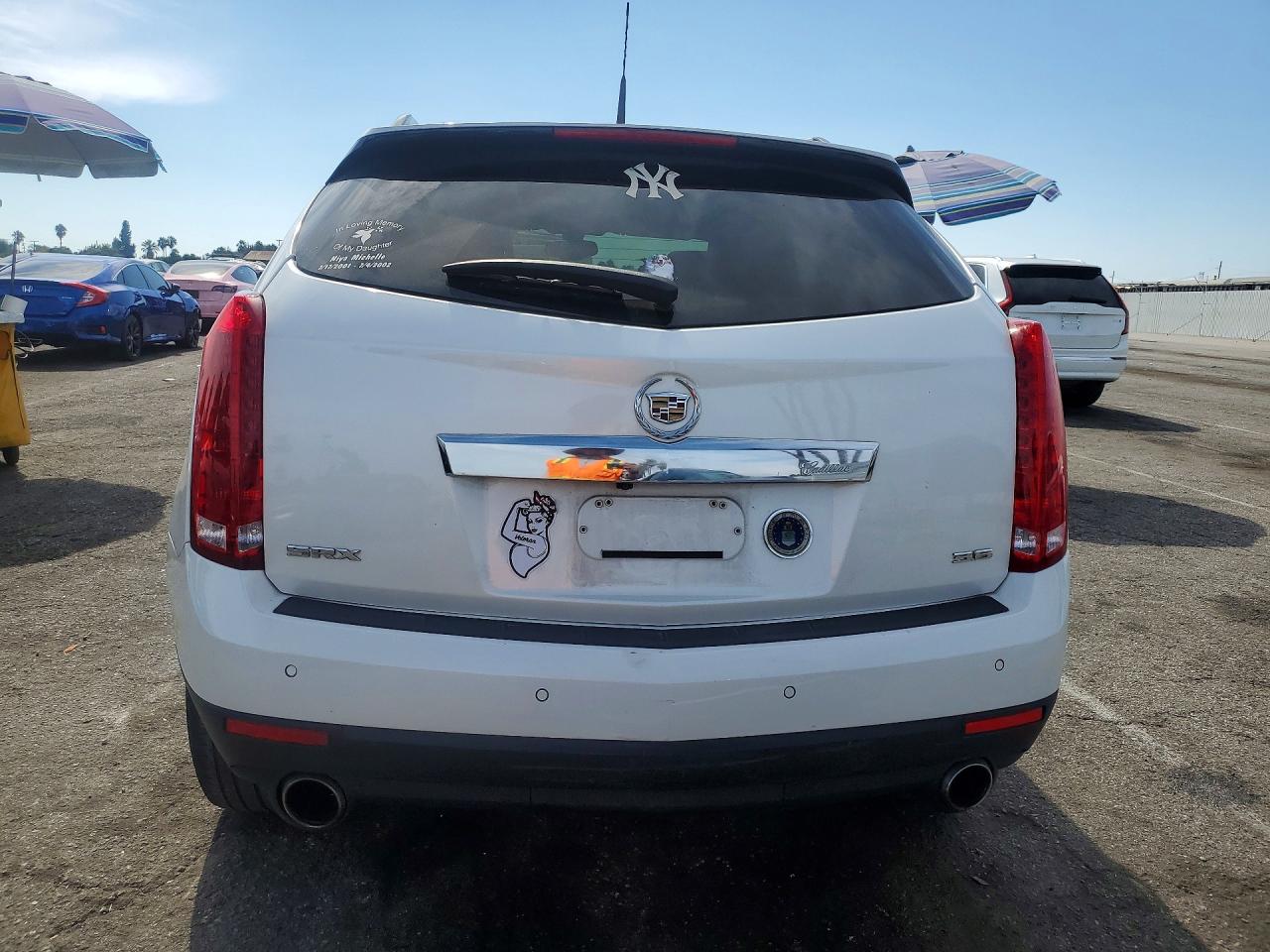 3GYFNBE31ES635653 · 2014 CADILLAC SRX · 6/13