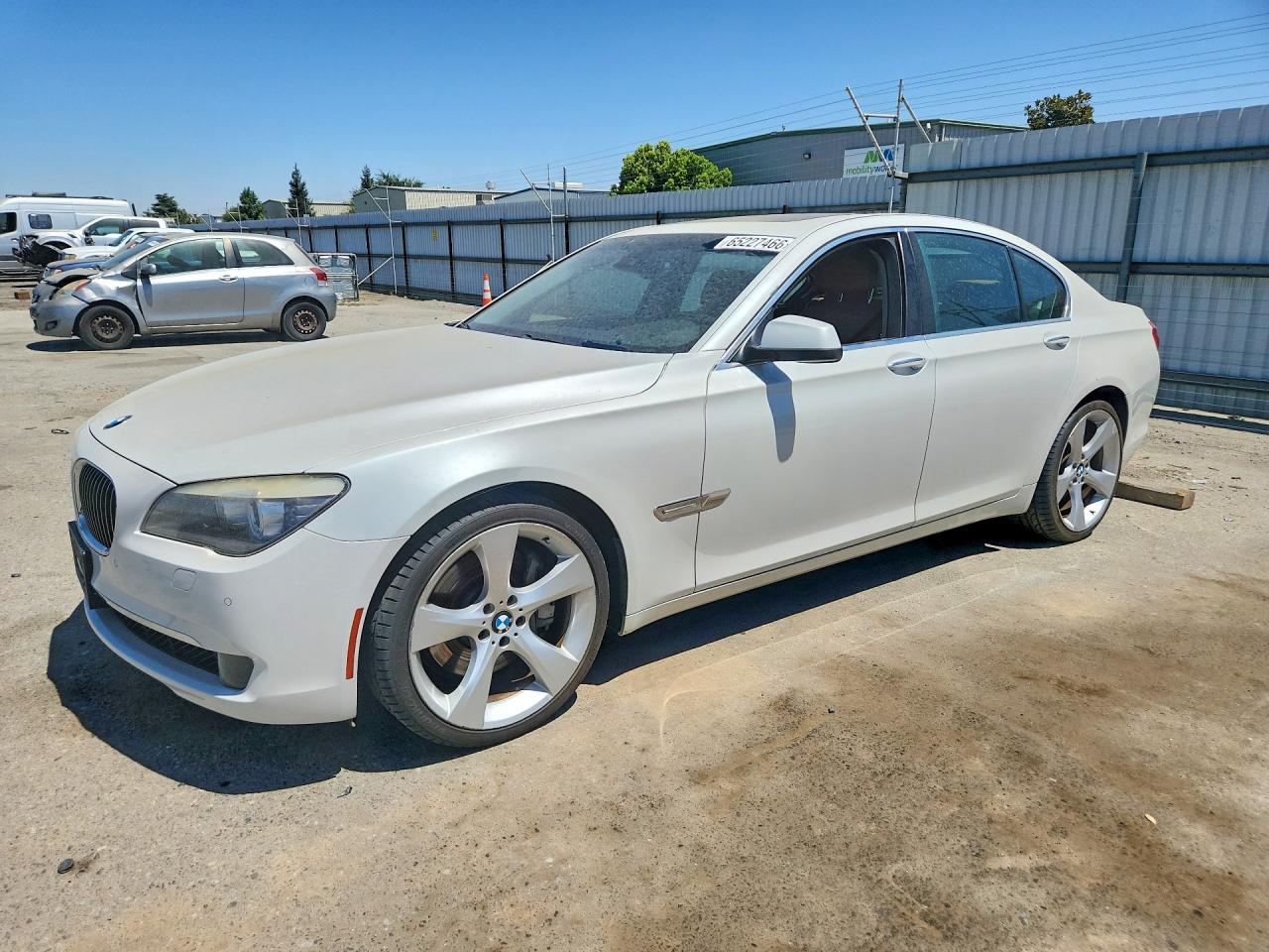 WBAKA8C5XBCY37106 · 2011 BMW 7 SERIES