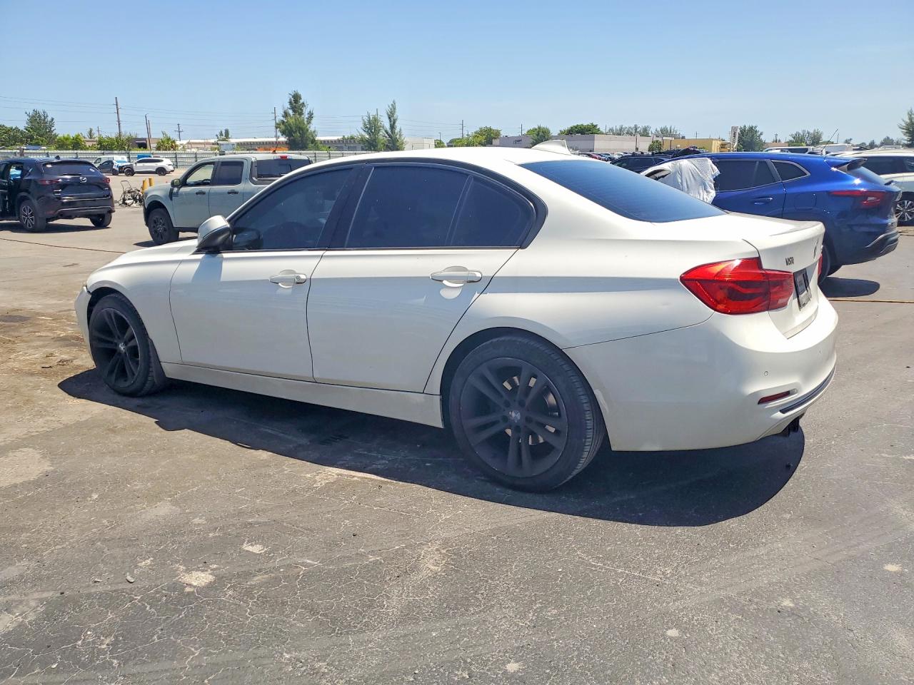WBA8E9G50GNU29322 · 2016 BMW 328 · 2/12