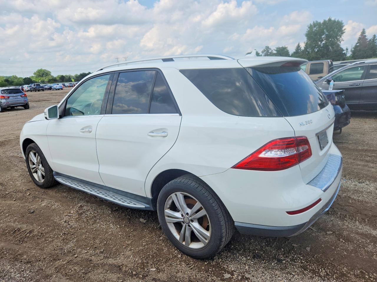 4JGDA2EB9EA356934 · 2014 MERCEDES-BENZ ML · 2/13