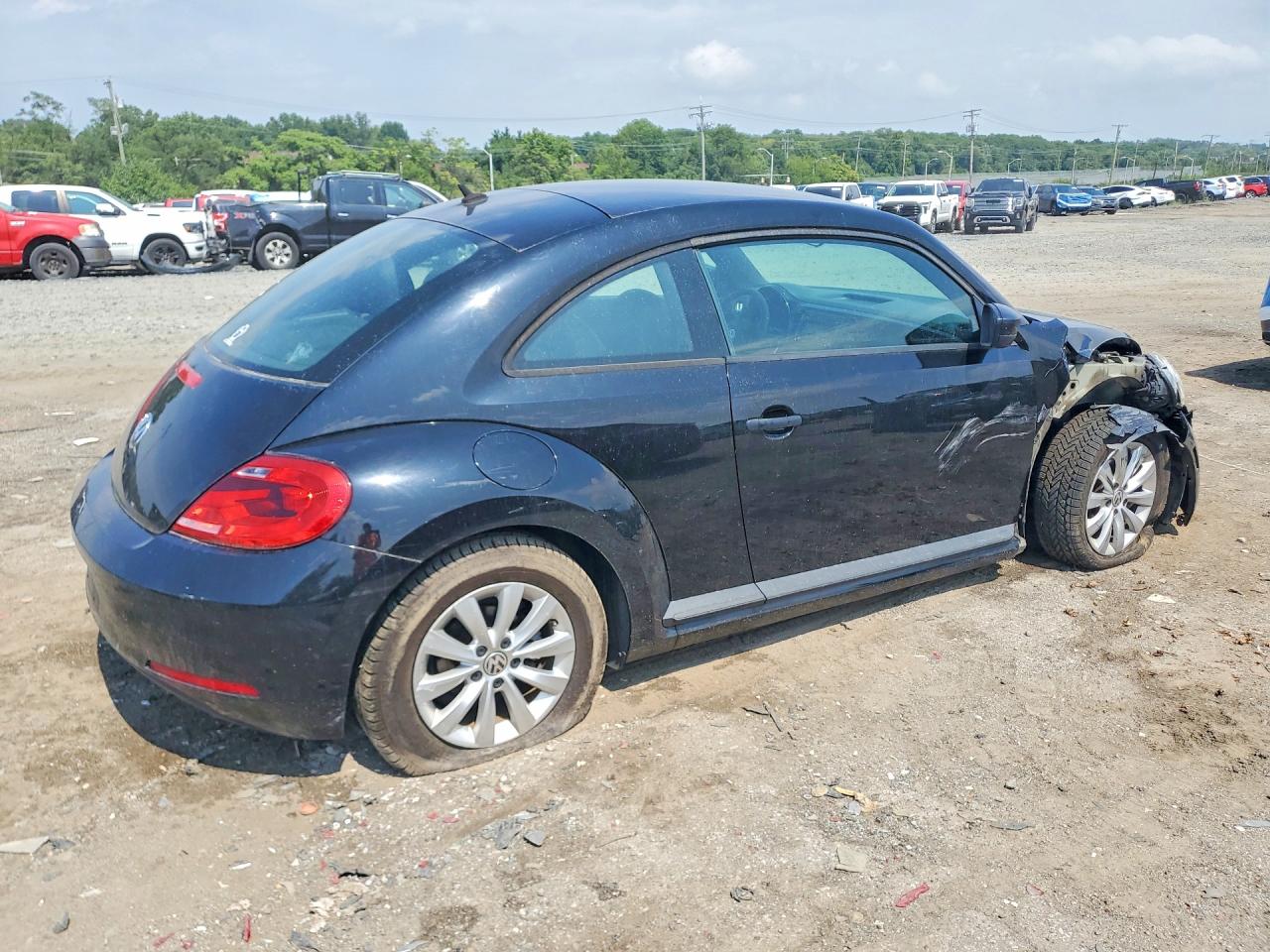 3VWF17AT6FM619374 · 2015 VOLKSWAGEN BEETLE · 3/12