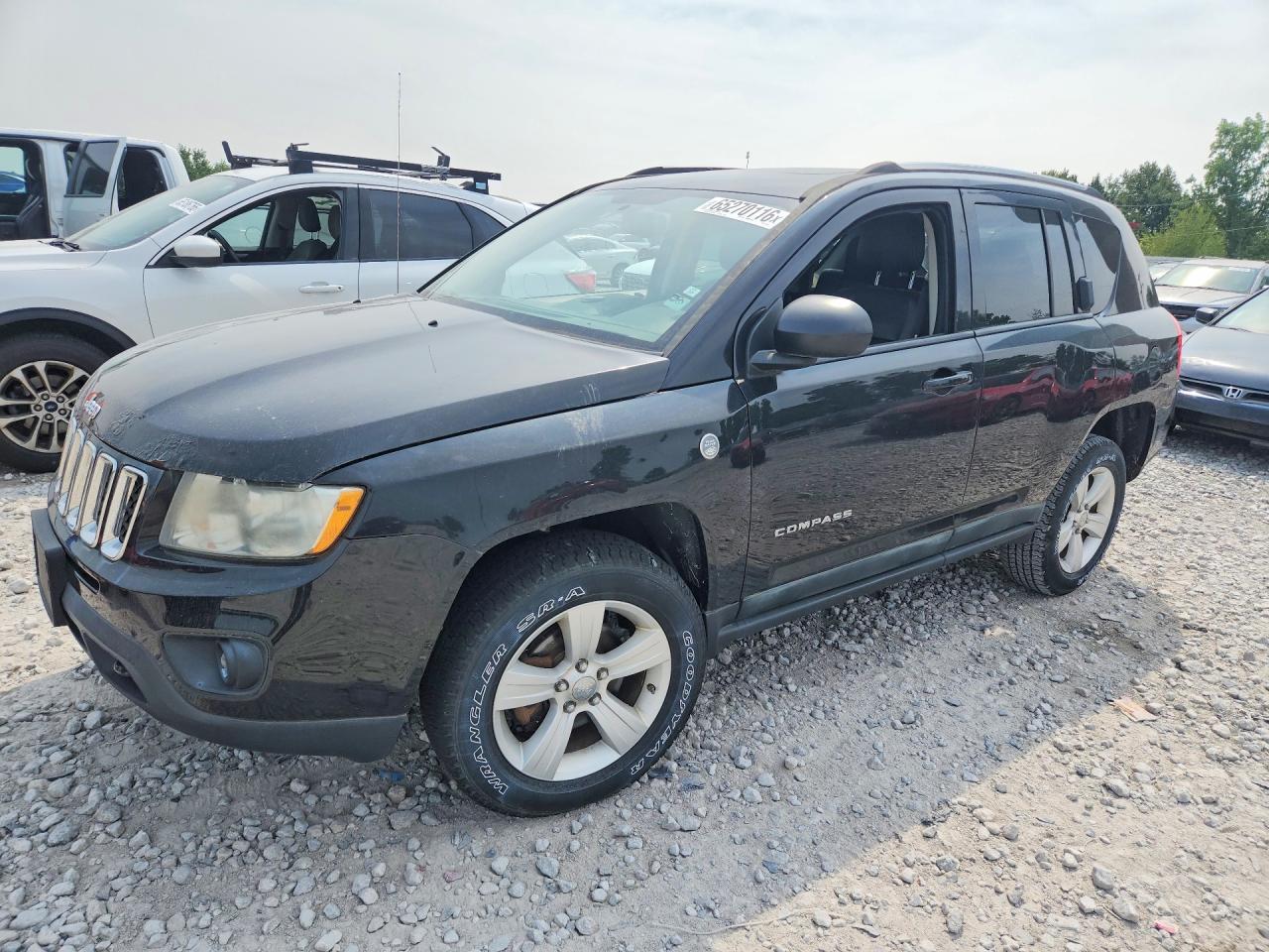 1J4NF5FB4BD174279 · 2011 JEEP COMPASS