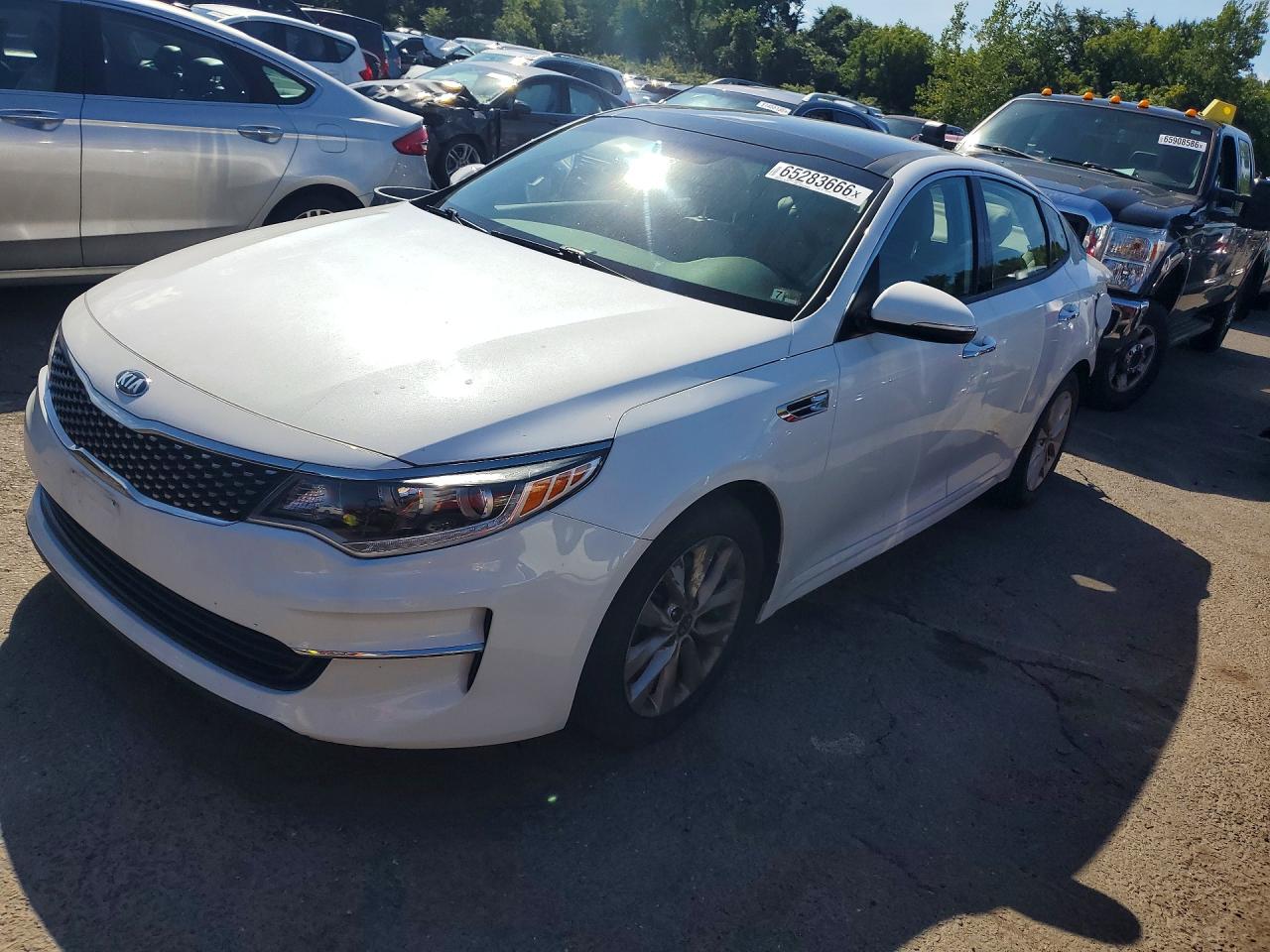 5XXGU4L34JG239180 · 2018 KIA OPTIMA