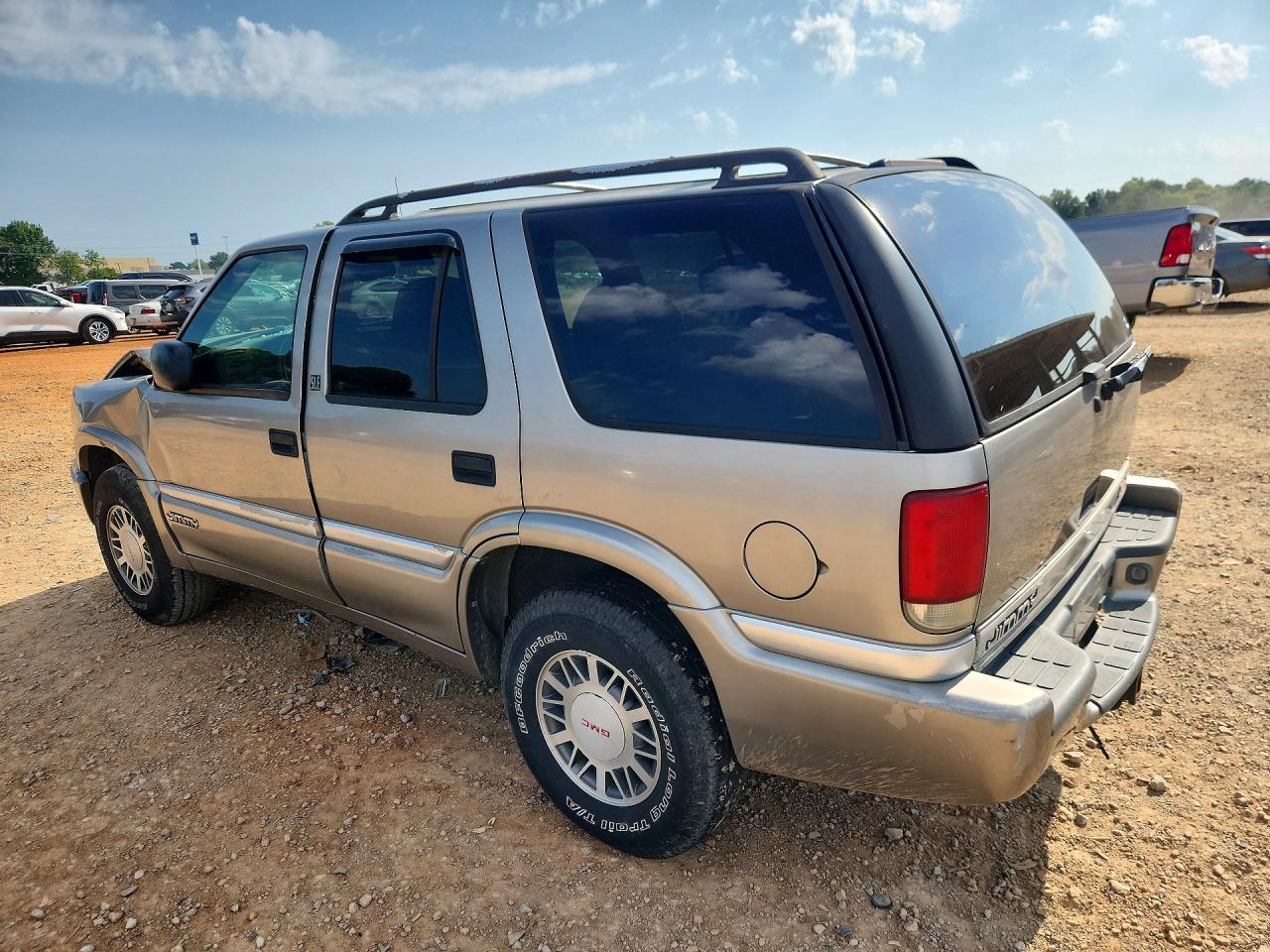 1GKDT13WXX2521311 · 1999 GMC JIMMY · 2/13
