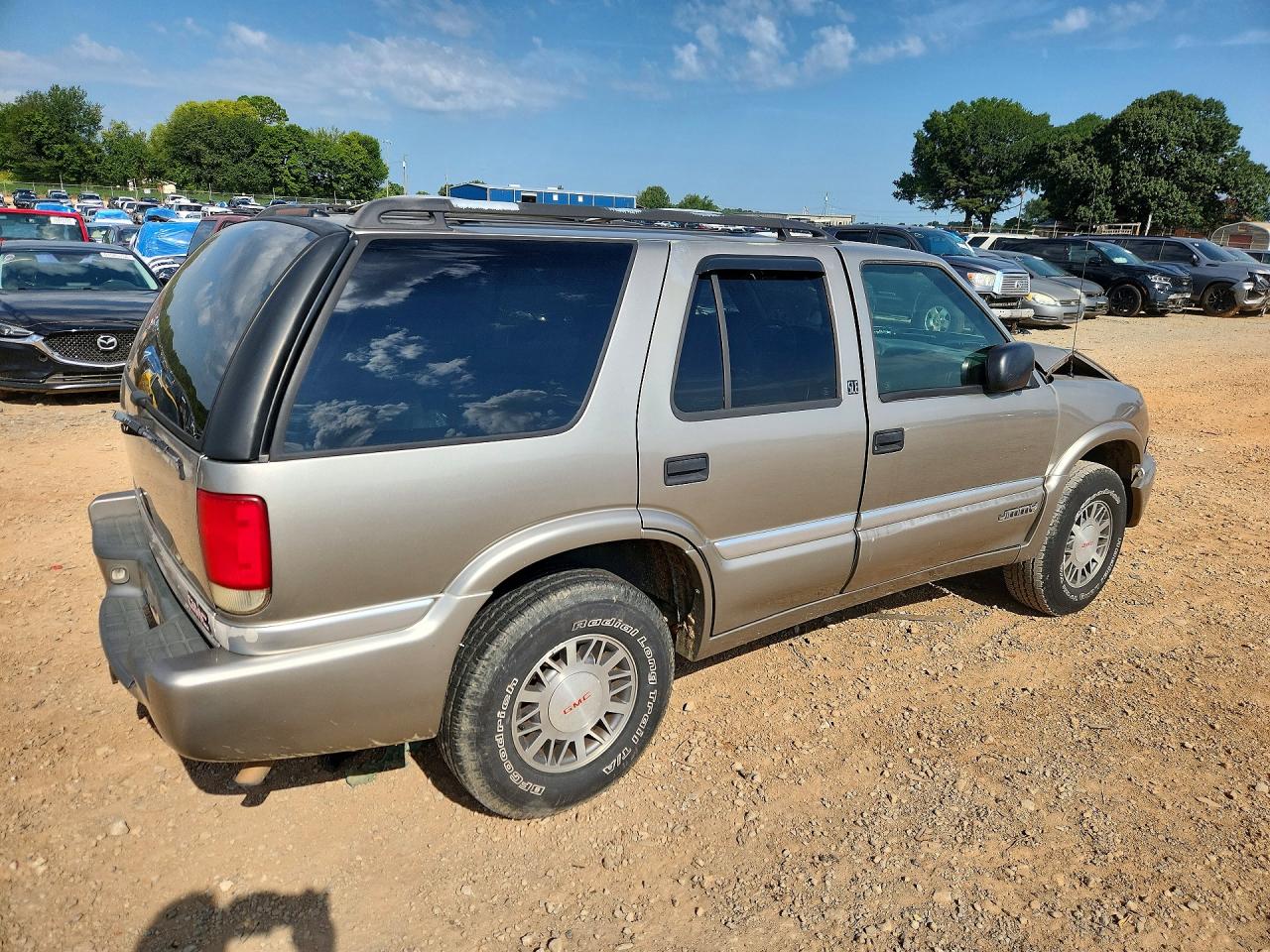 1GKDT13WXX2521311 · 1999 GMC JIMMY · 3/13