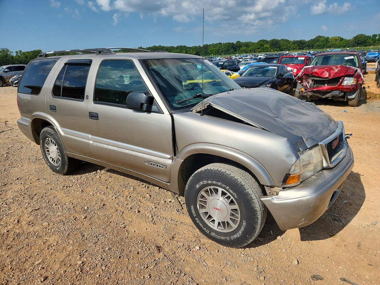 1GKDT13WXX2521311 · 1999 GMC JIMMY · 4/13