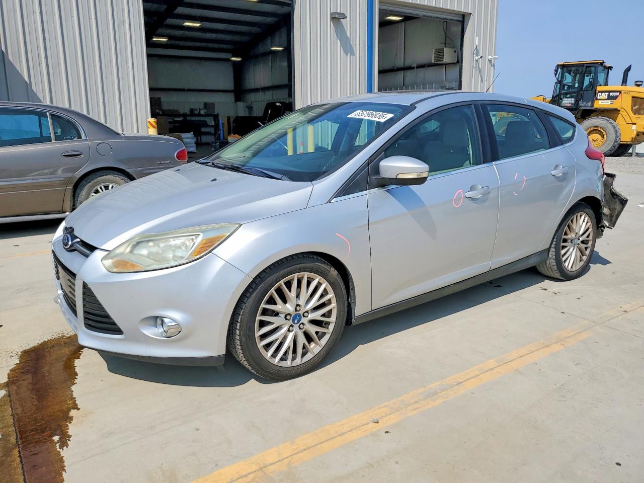 1FAHP3M27CL120706 · 2012 FORD FOCUS