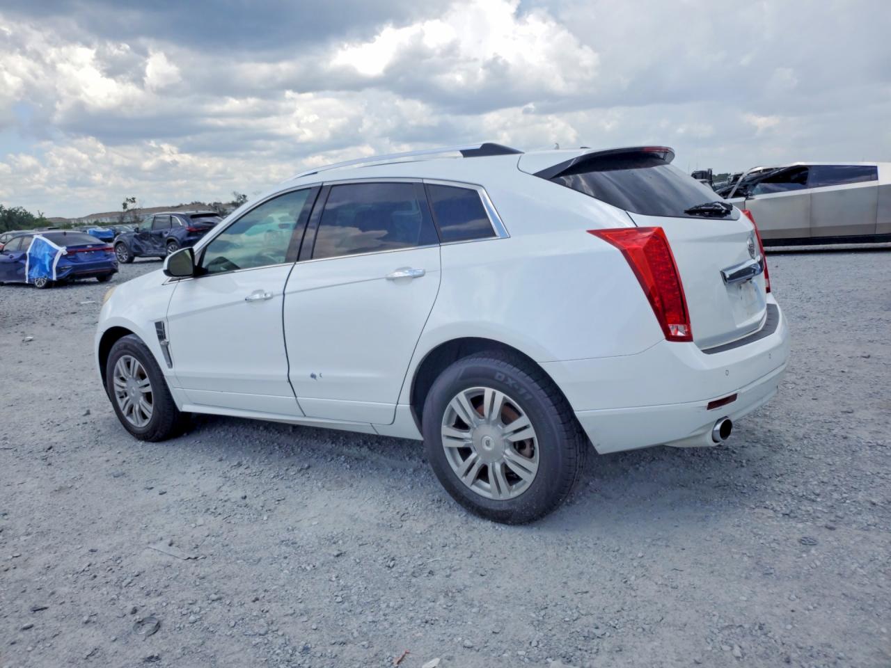 3GYFNAEY2BS632682 · 2011 CADILLAC SRX · 2/13