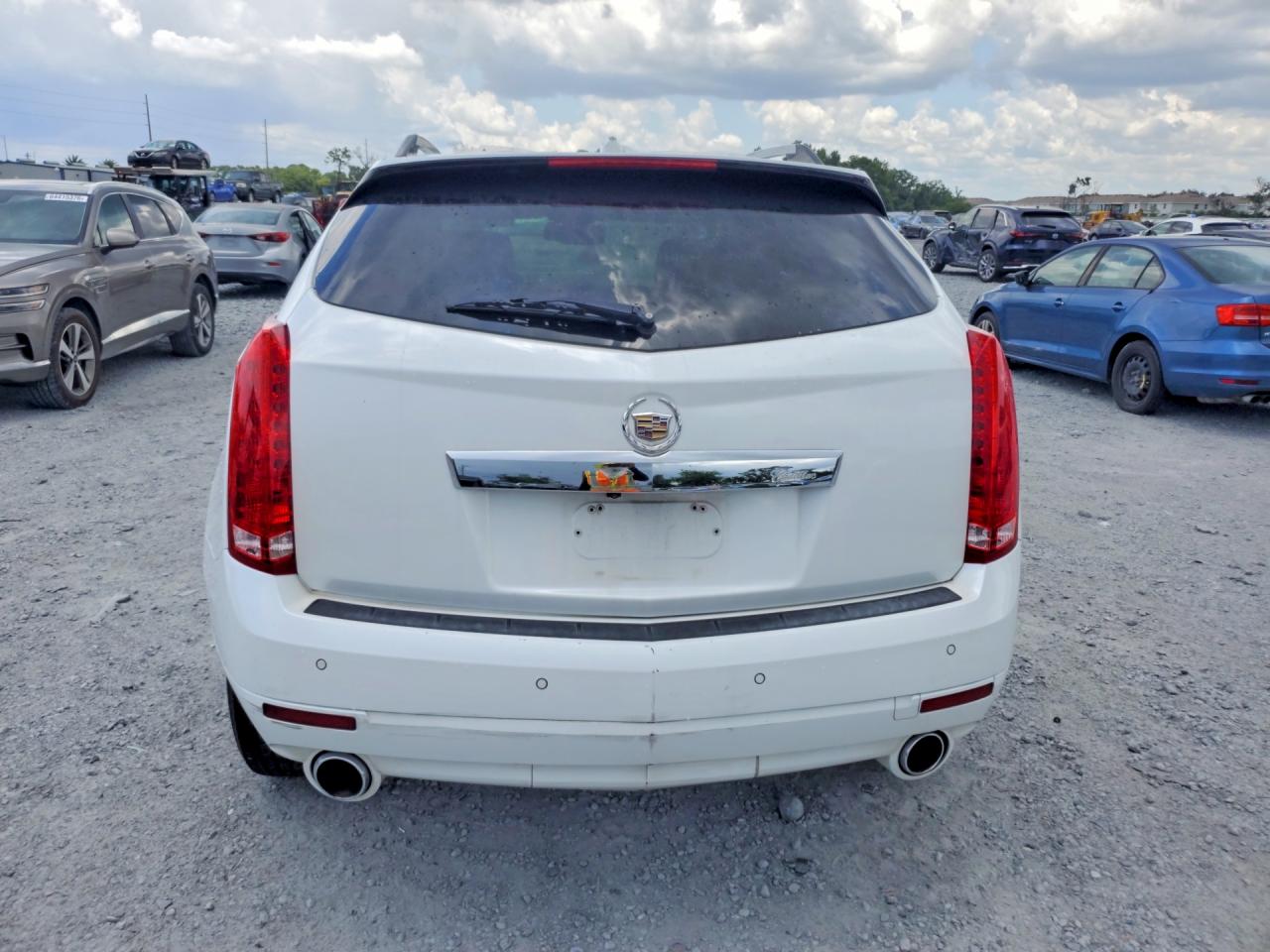3GYFNAEY2BS632682 · 2011 CADILLAC SRX · 6/13