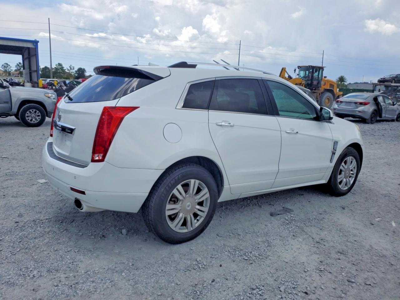 3GYFNAEY2BS632682 · 2011 CADILLAC SRX · 3/13