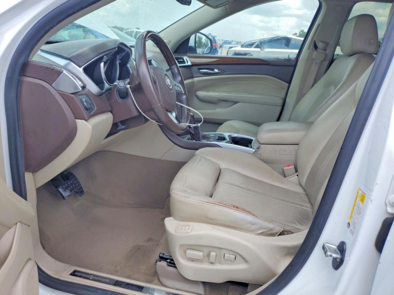3GYFNAEY2BS632682 · 2011 CADILLAC SRX · 7/13
