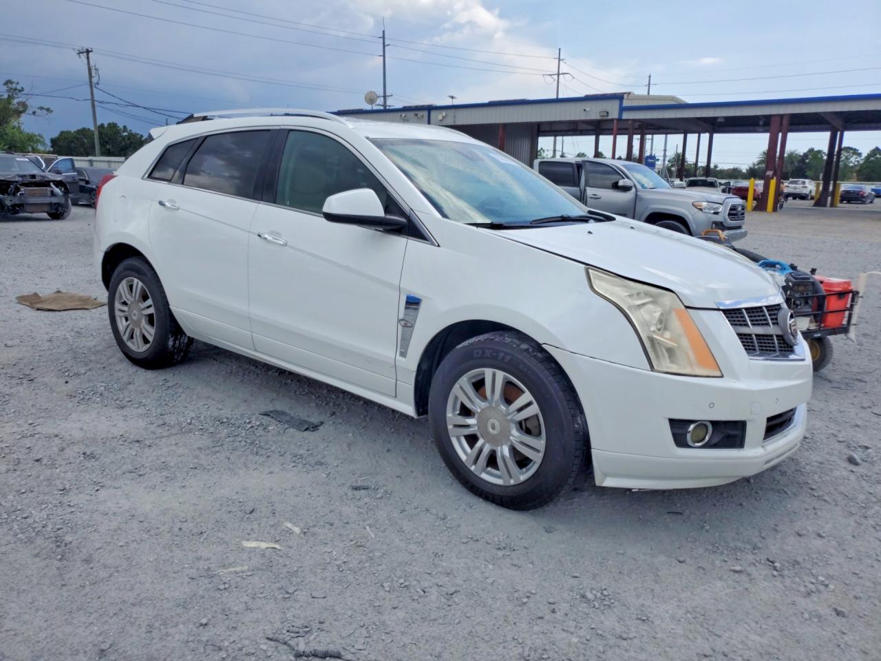 3GYFNAEY2BS632682 · 2011 CADILLAC SRX · 4/13