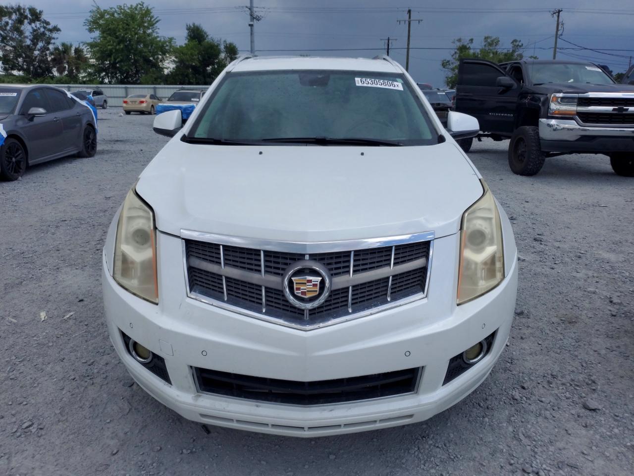 3GYFNAEY2BS632682 · 2011 CADILLAC SRX · 5/13