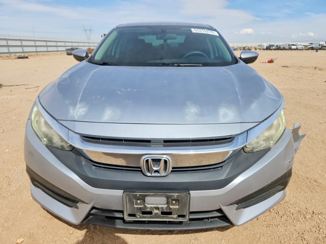 2HGFC2F55HH506027 · 2017 HONDA CIVIC · 5/12