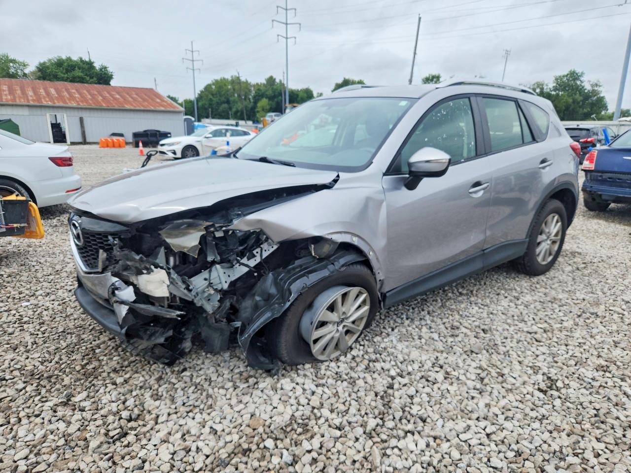JM3KE2BE1F0511053 · 2015 MAZDA CX-5