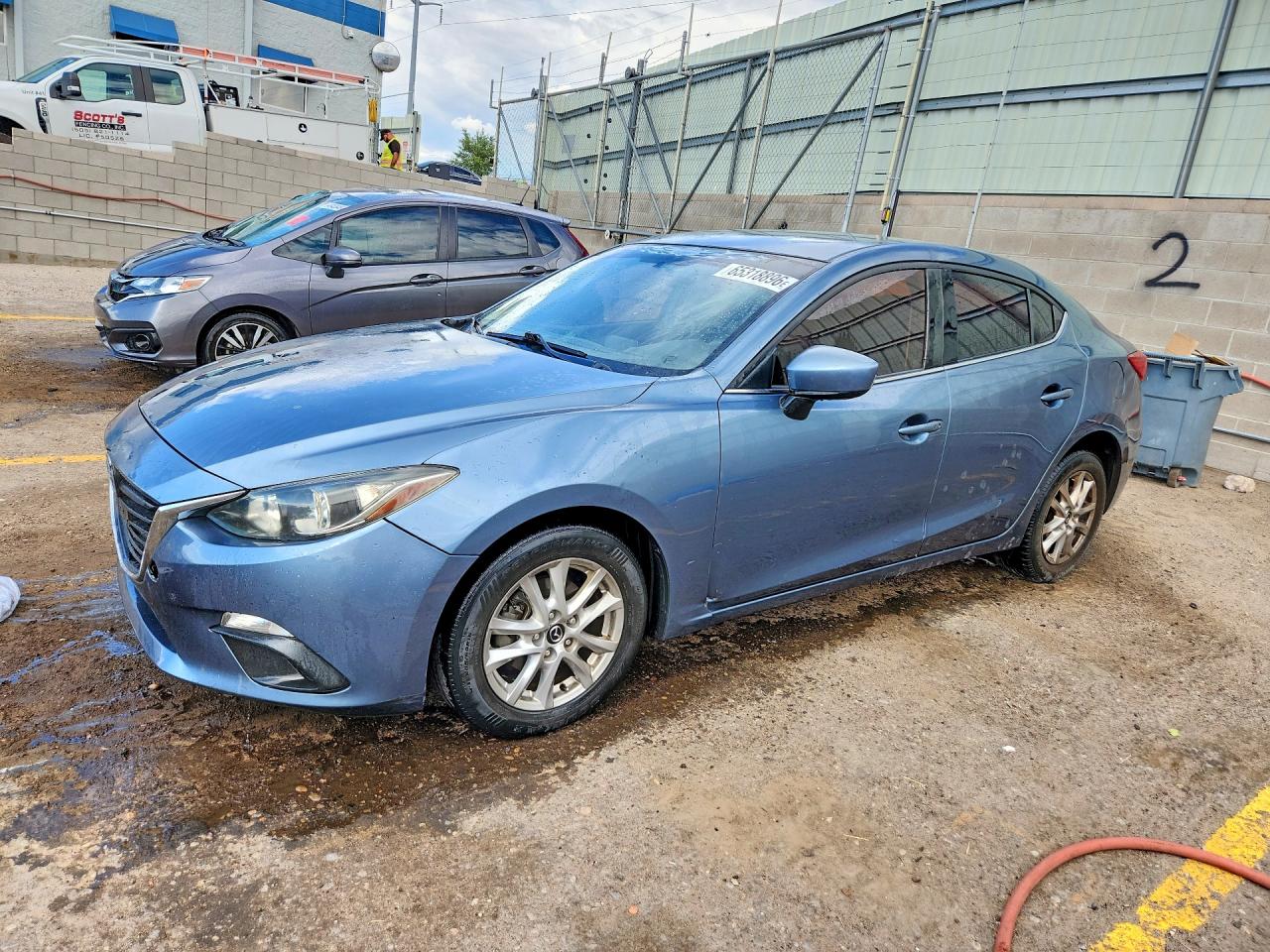 JM1BM1V75E1126140 · 2014 MAZDA 3