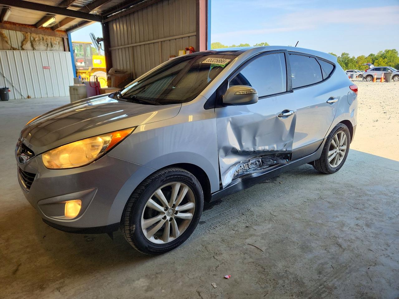 KM8JU3AC1DU695103 · 2013 HYUNDAI TUCSON