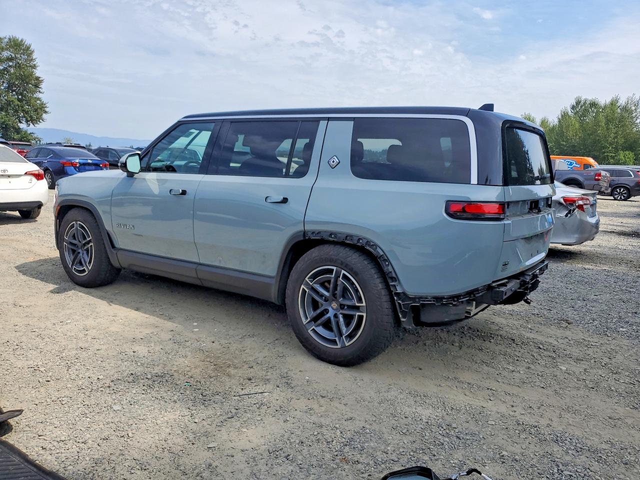7PDSGBBA1SN047509 · 2025 RIVIAN R1S · 2/14
