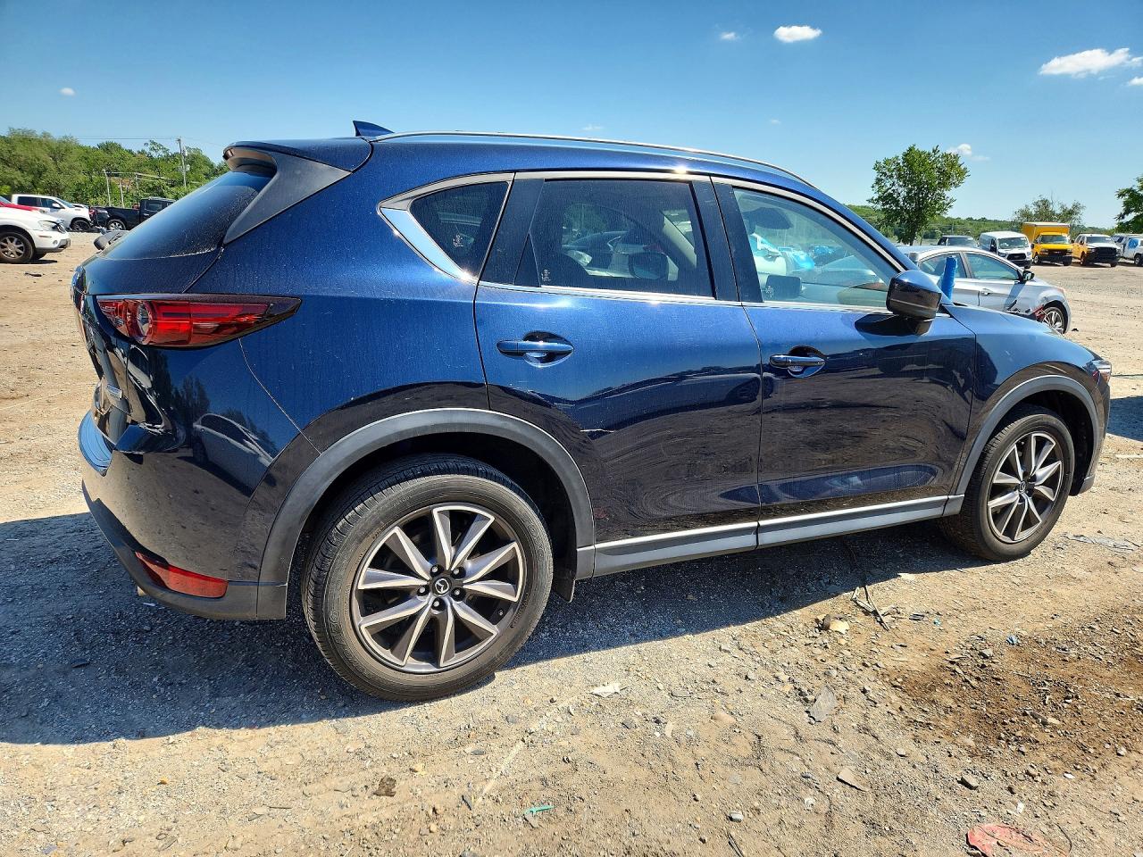 JM3KFADM2J0466564 · 2018 MAZDA CX-5 · 3/13