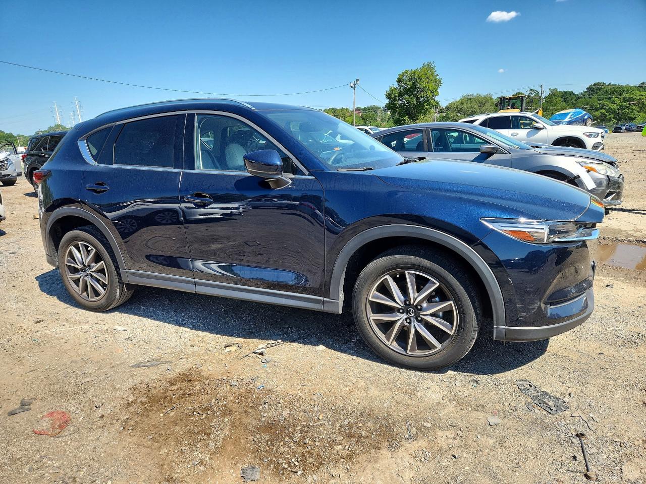 JM3KFADM2J0466564 · 2018 MAZDA CX-5 · 4/13