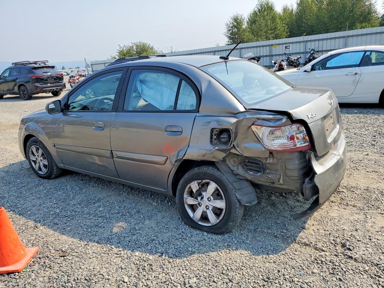 KNADH4A33B6955737 · 2011 KIA RIO · 2/12