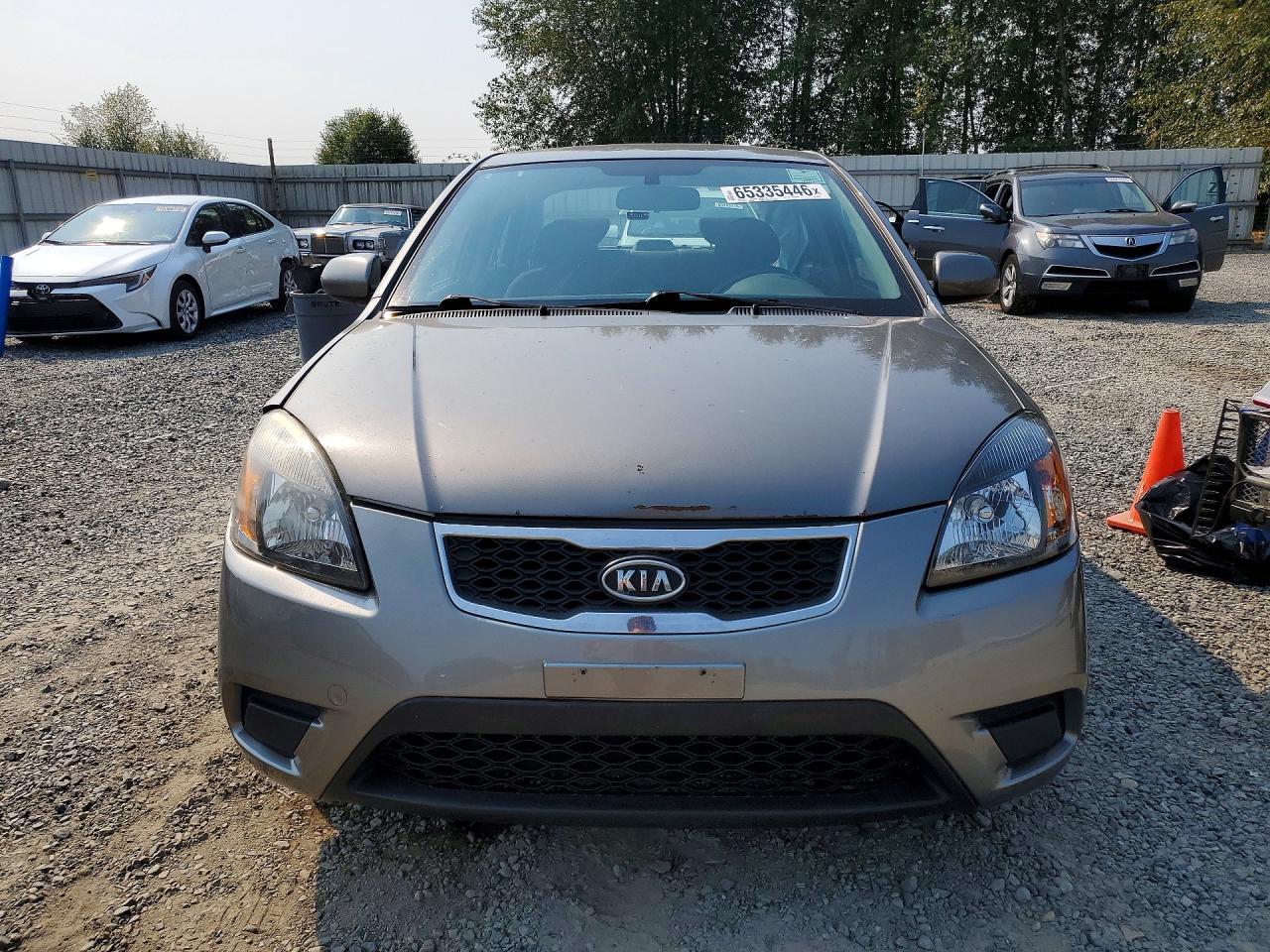 KNADH4A33B6955737 · 2011 KIA RIO · 5/12