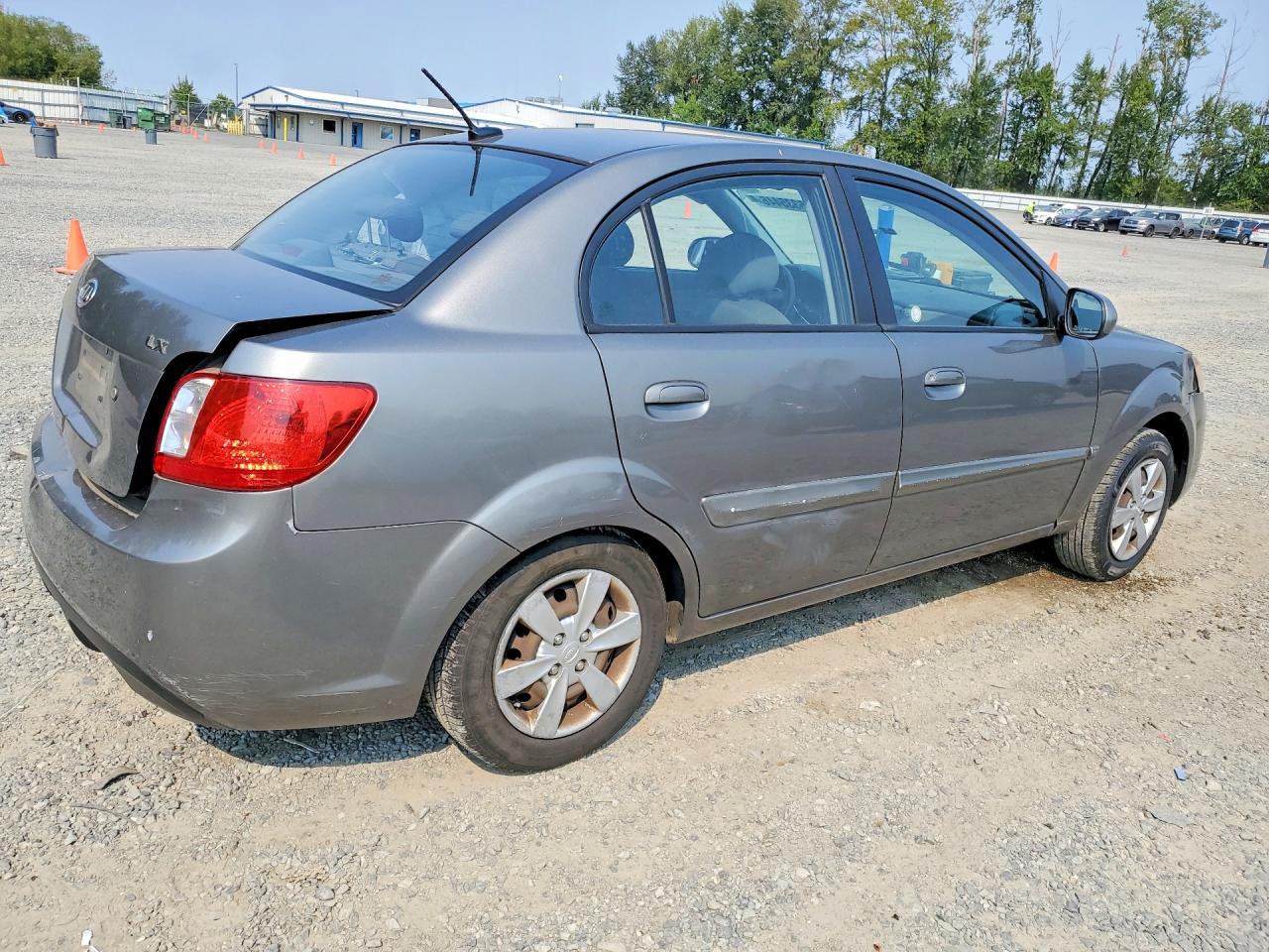 KNADH4A33B6955737 · 2011 KIA RIO · 3/12