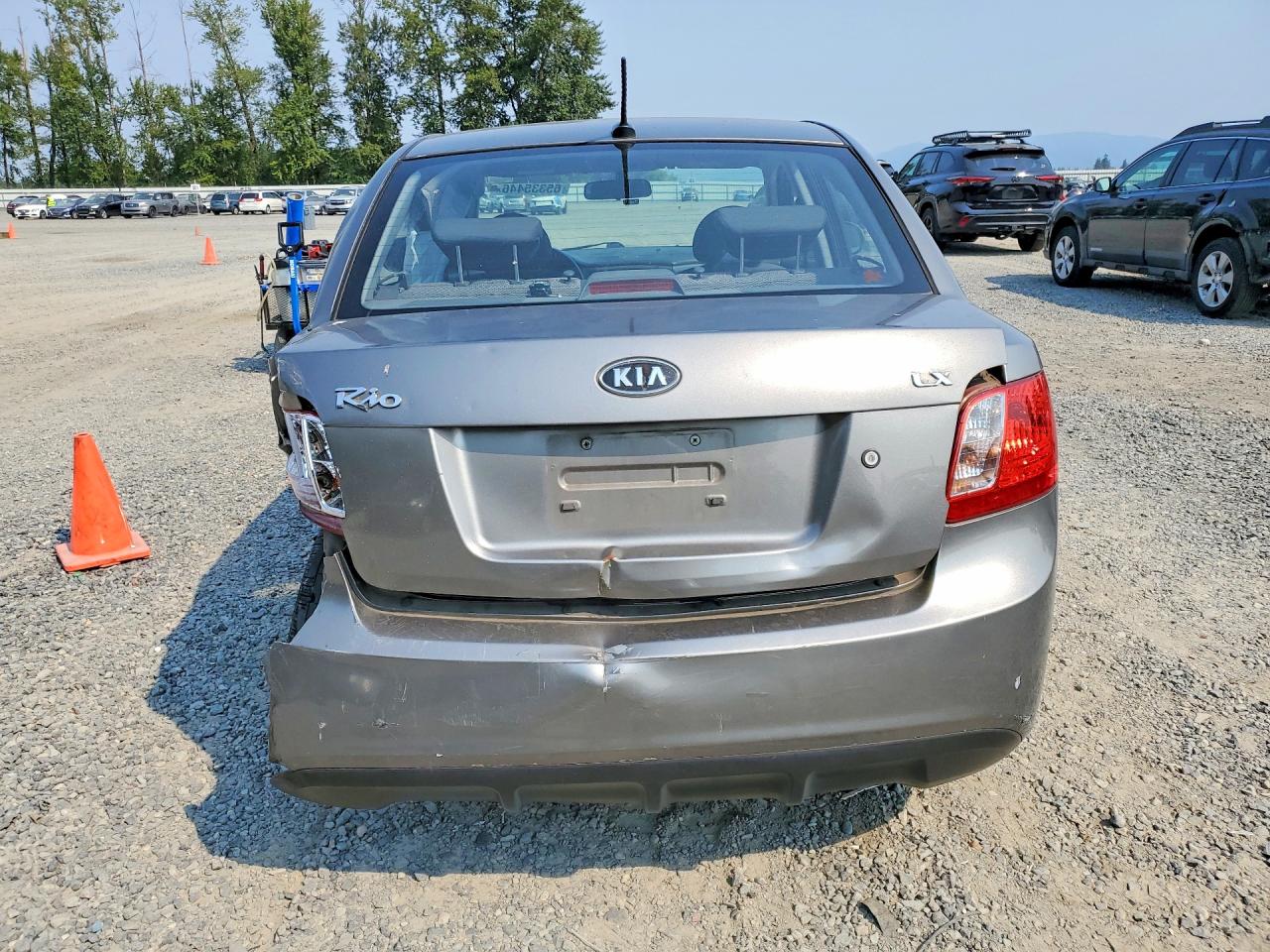 KNADH4A33B6955737 · 2011 KIA RIO · 6/12