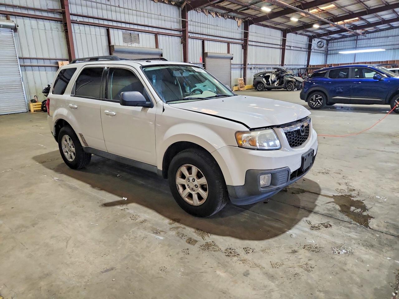 4F2CZ06G29KM02336 · 2009 MAZDA TRIBUTE · 4/13