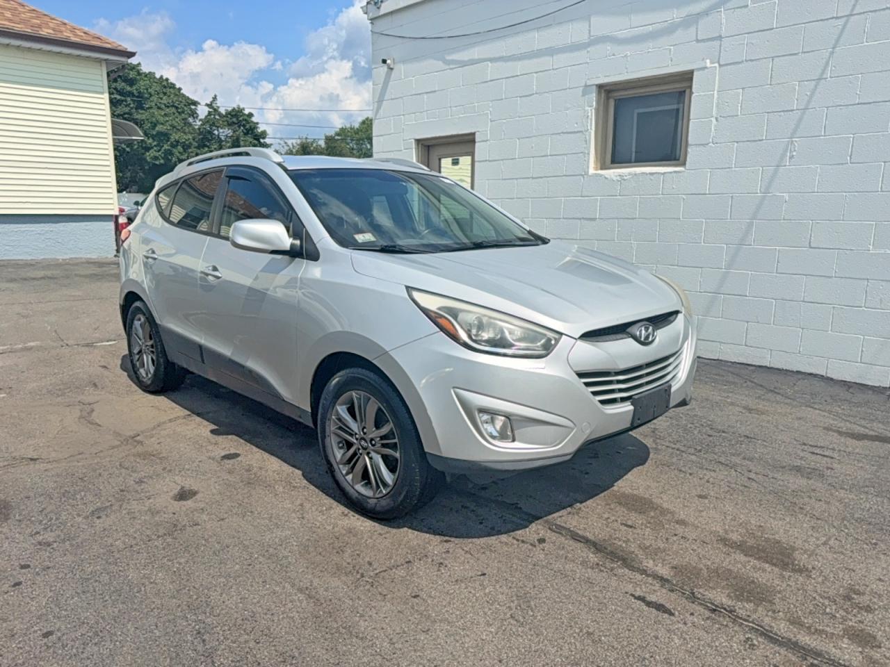 KM8JUCAG7EU796599 · 2014 HYUNDAI TUCSON