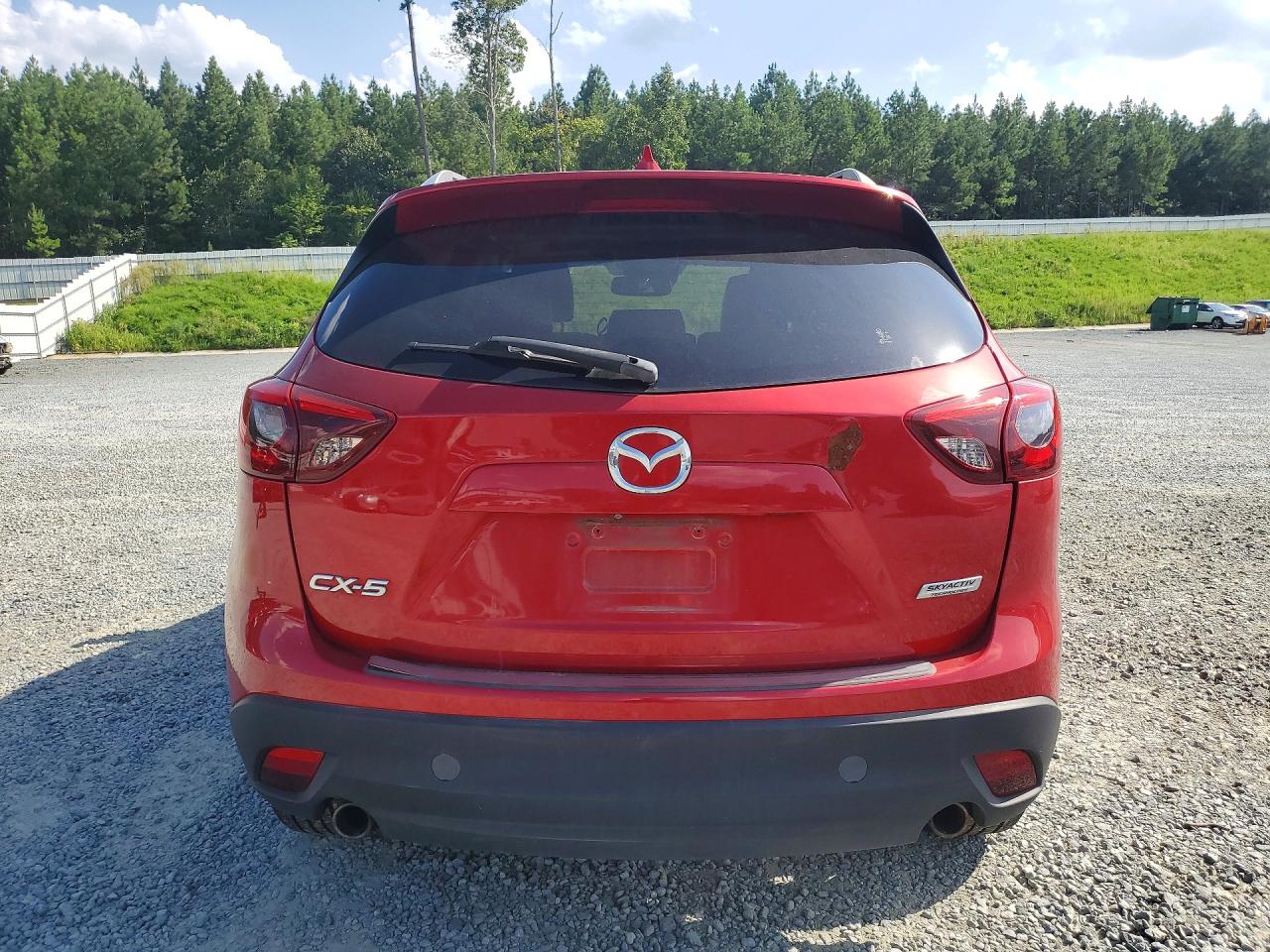JM3KE2DY6G0730891 · 2016 MAZDA CX-5 · 6/13