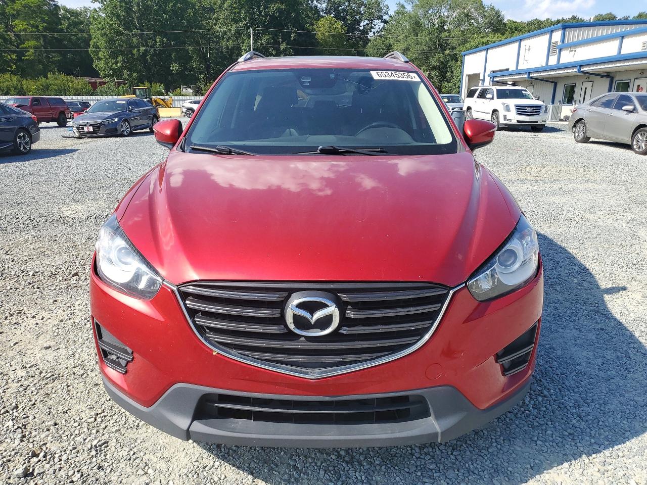 JM3KE2DY6G0730891 · 2016 MAZDA CX-5 · 5/13