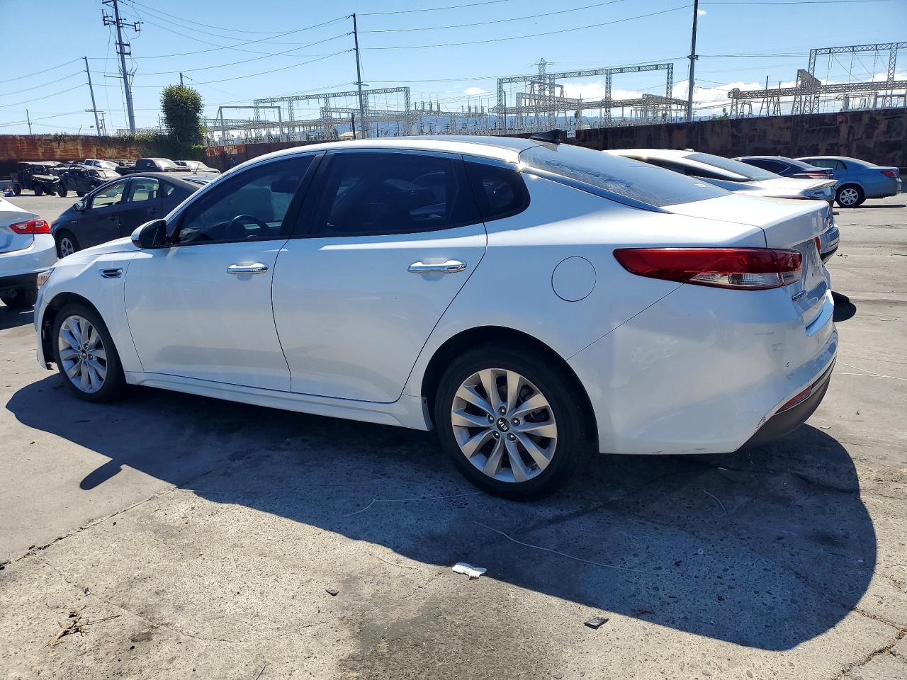 5XXGU4L35GG046934 · 2016 KIA OPTIMA · 2/12